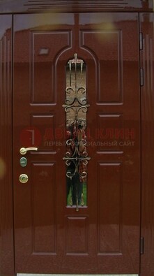 Красивая металлическая дверь со стеклом и ковкой ДСК-33 в Туле