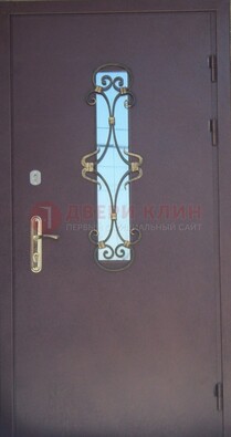 Металлическая дверь со стеклом и ковкой ДСК-77 в Ставрополе